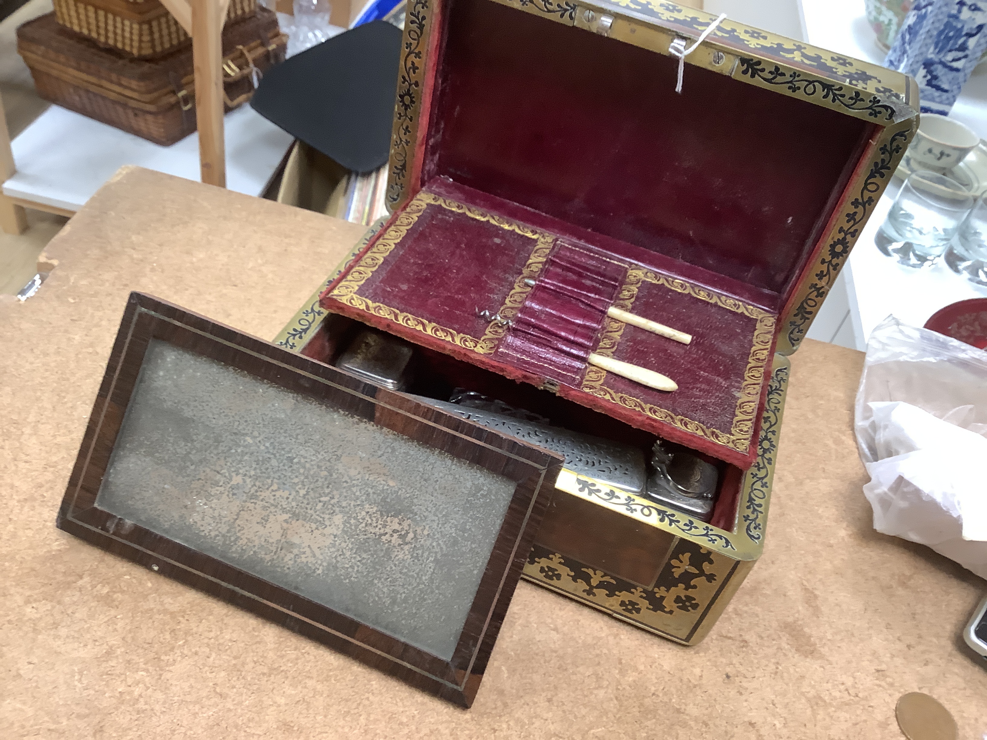 A William IV Cut brass, mahogany and ebony travelling vanity box, with silver-capped bottles, 24.5cm wide